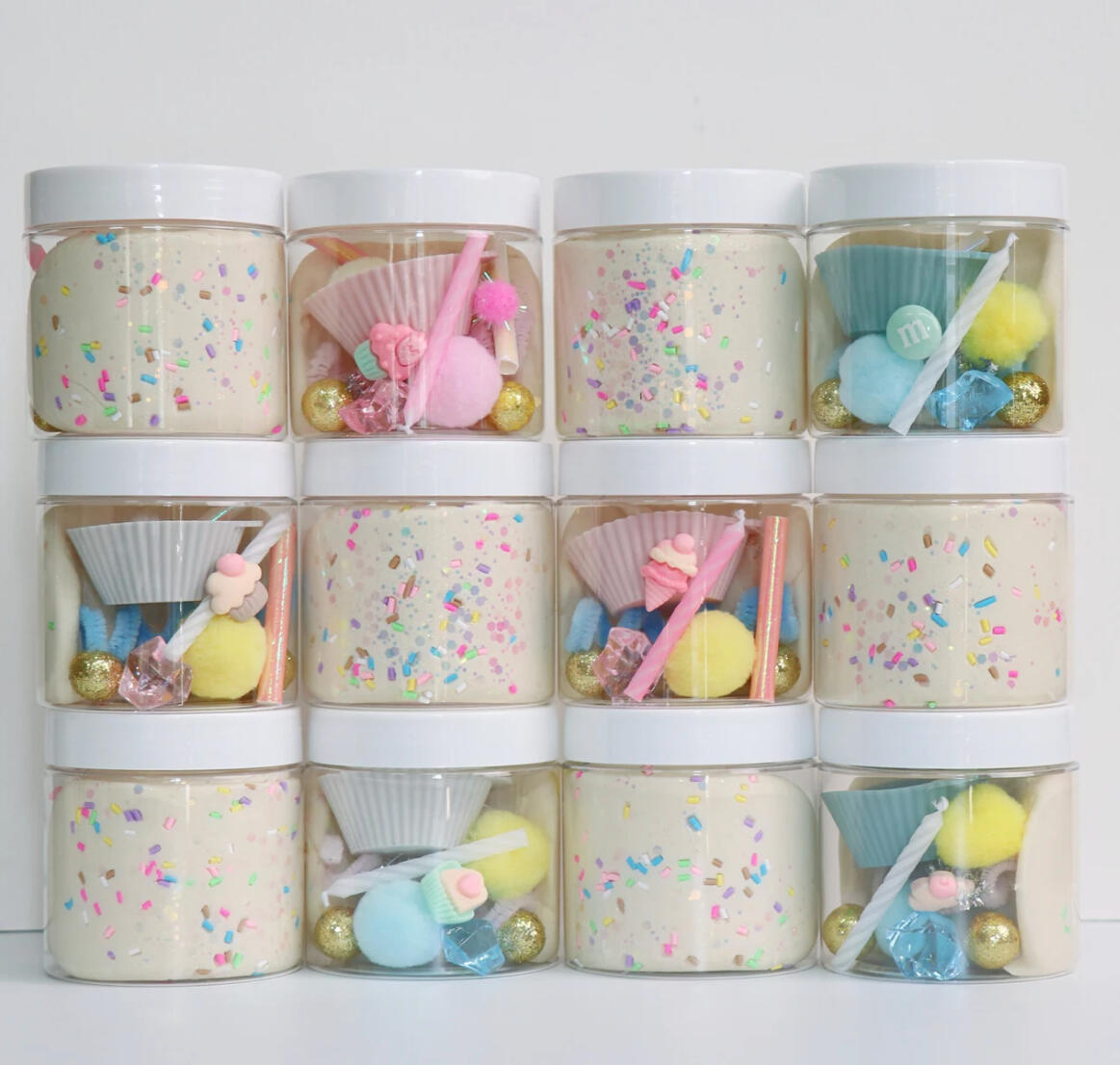 Sensory Kit Cups Sensory Kit Cup Party favors, custom goodie bags with reusable containers and sensory filler and toys.